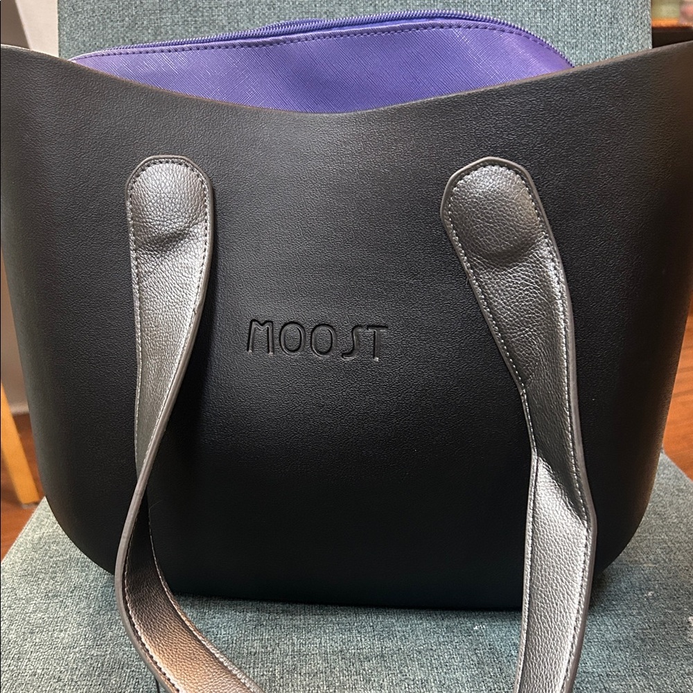 Moost Black Tote with Purple Interior and Dark Silver Handles like new so cool